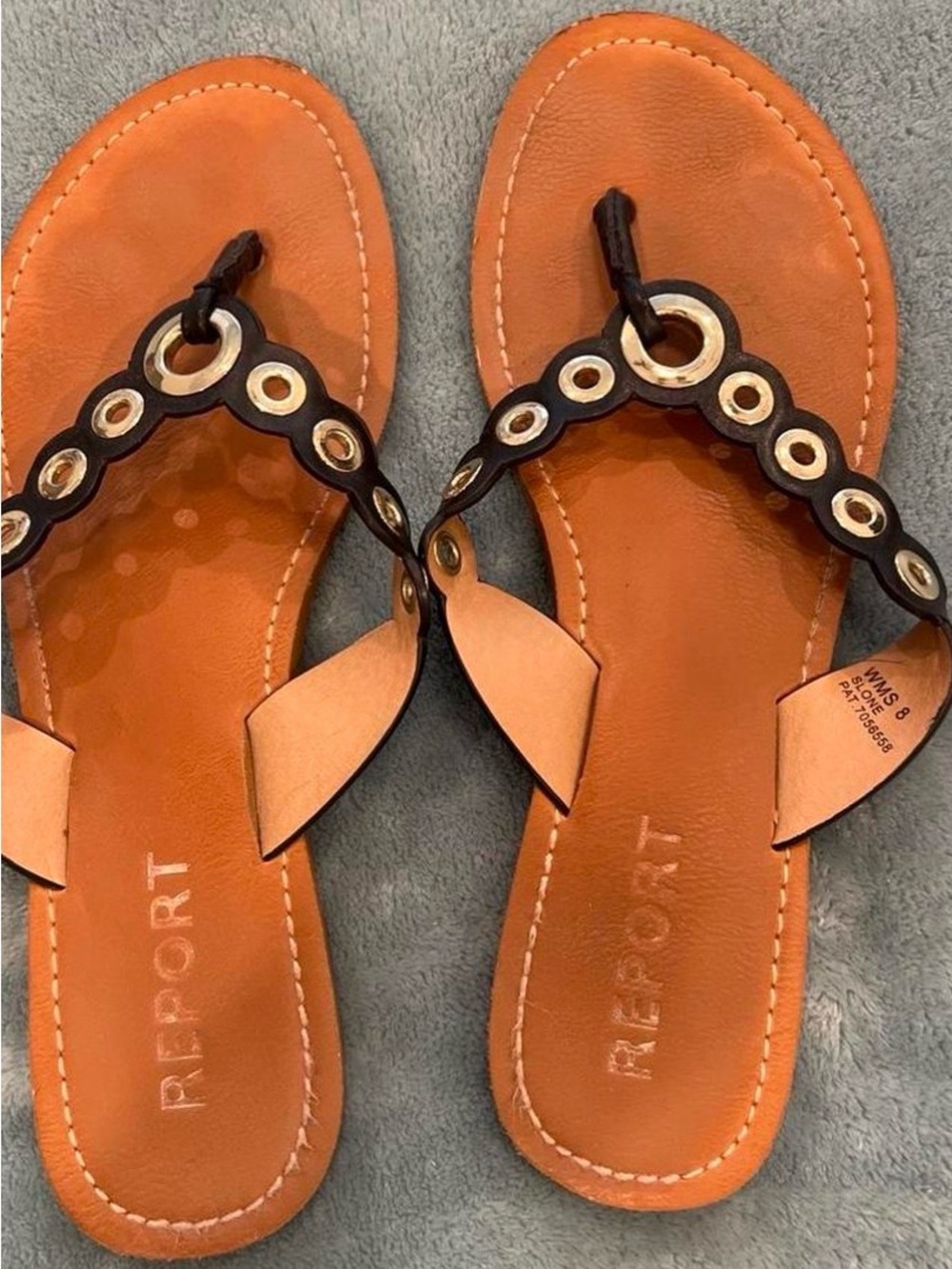 Report Tan and Black Grommet Toe-Post Sandals with Gold Accents